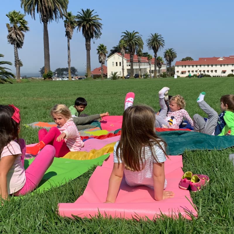 Children in a Yoga Class outside