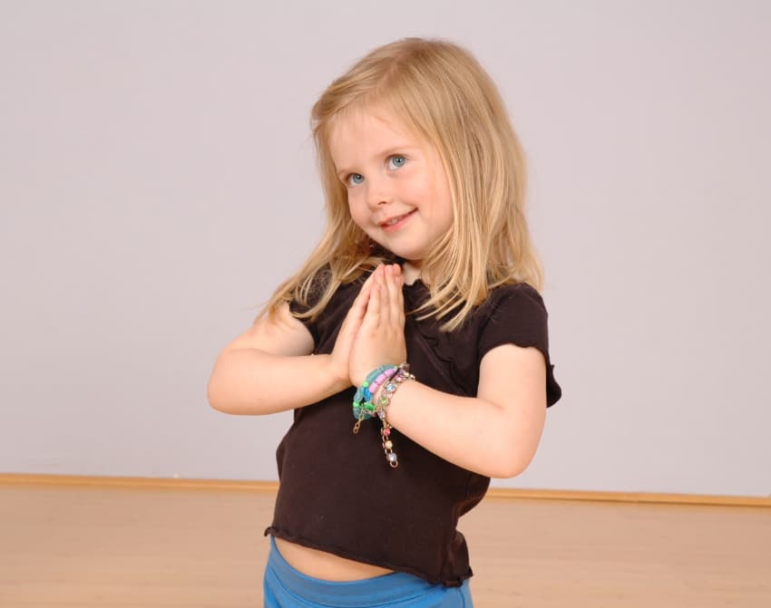 Young Child with hands in prayer position