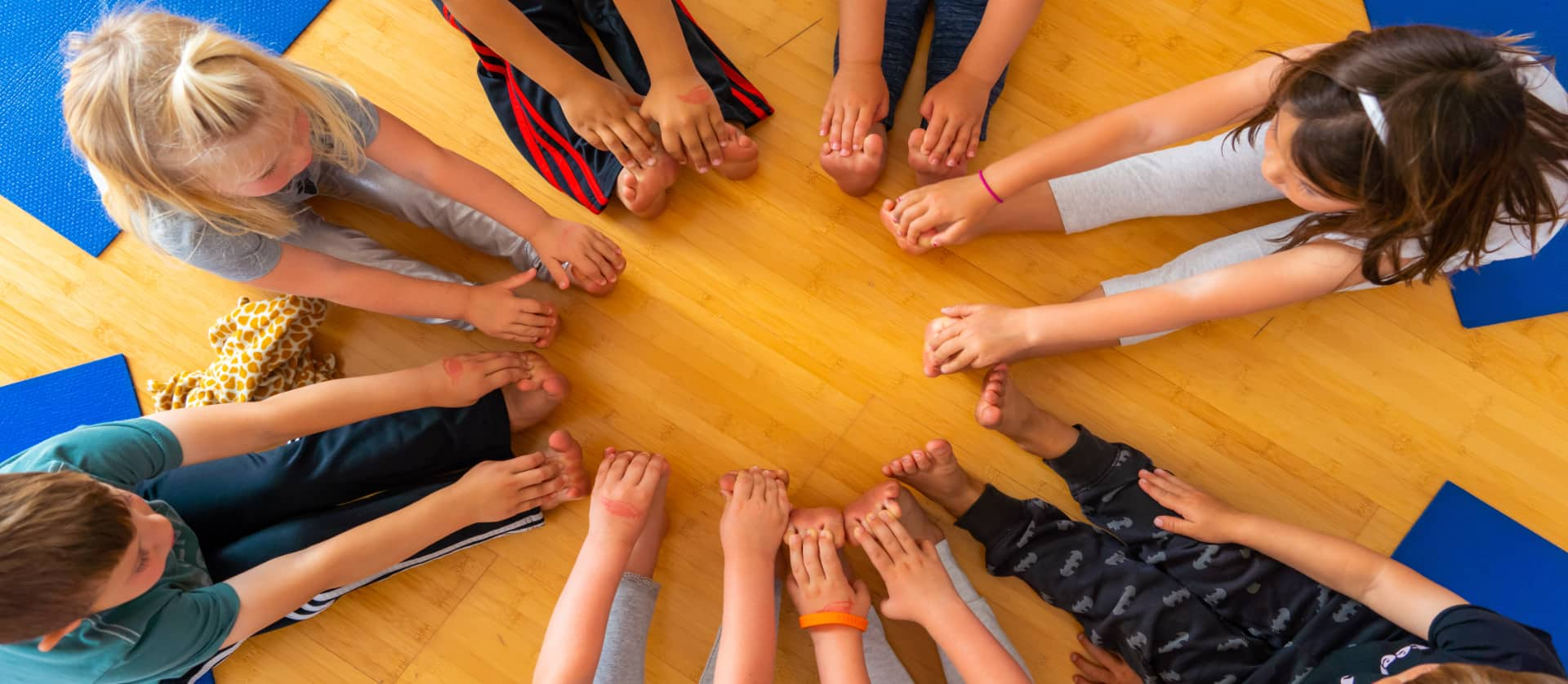 IYK children in yoga circle.