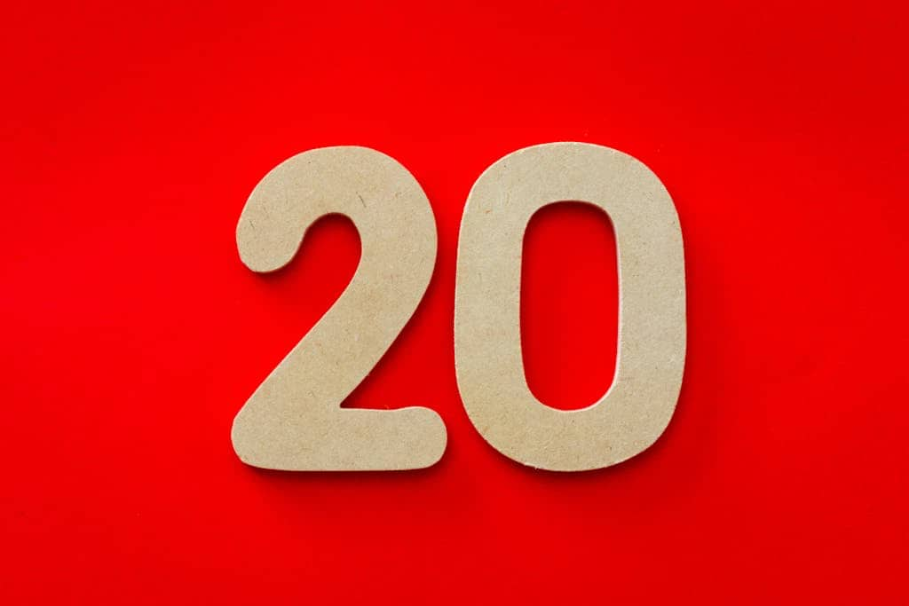 The number 20 on a red background