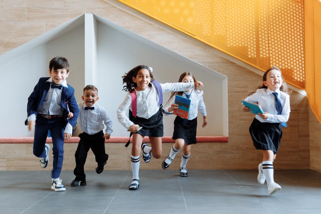 kids running in school uniforms