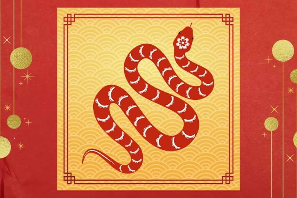 A red snake on a gold background